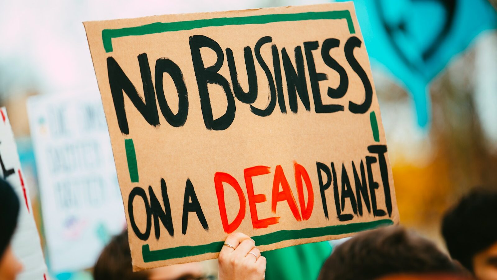 no business on a dead planet sign